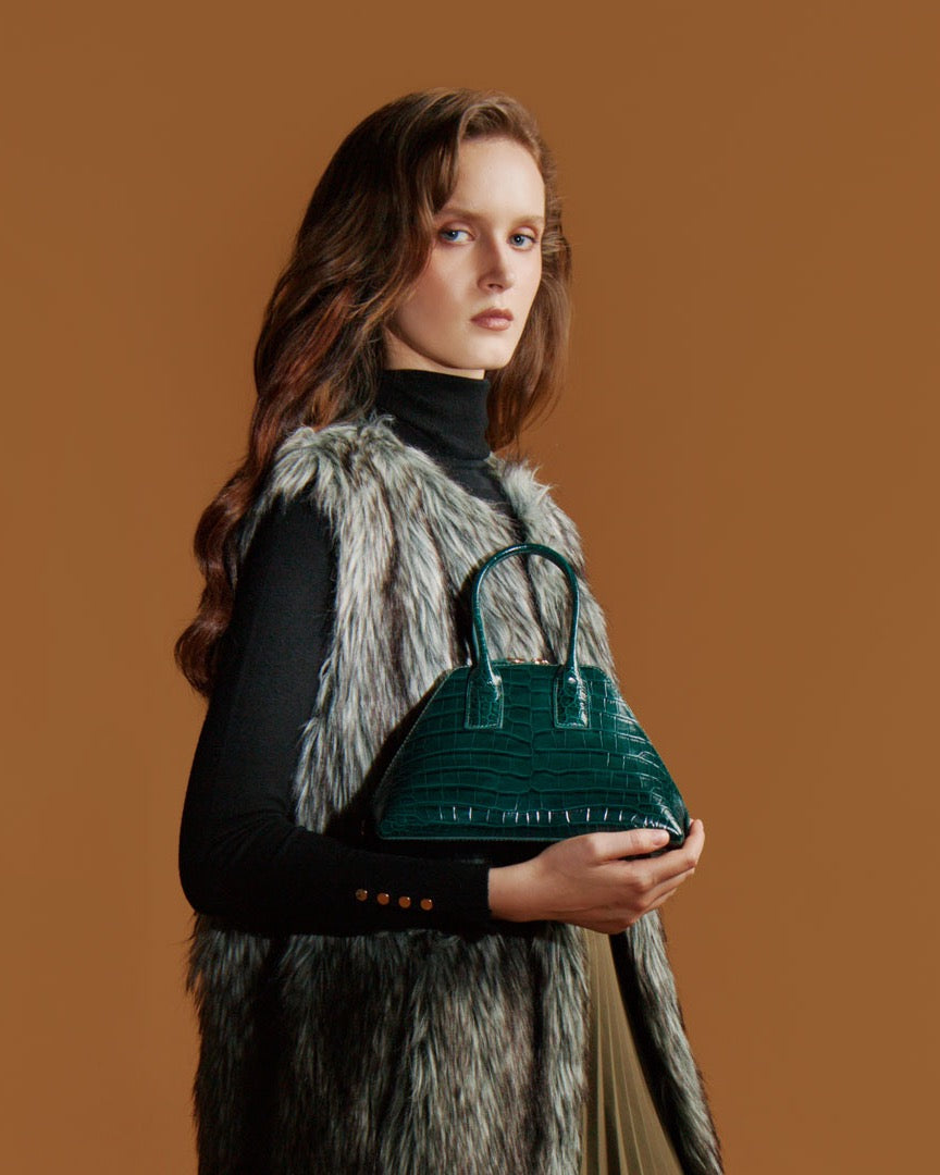 Model holding the BASEL Dark Green bag