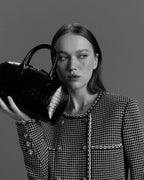 Model with the BOMBAY Black bag