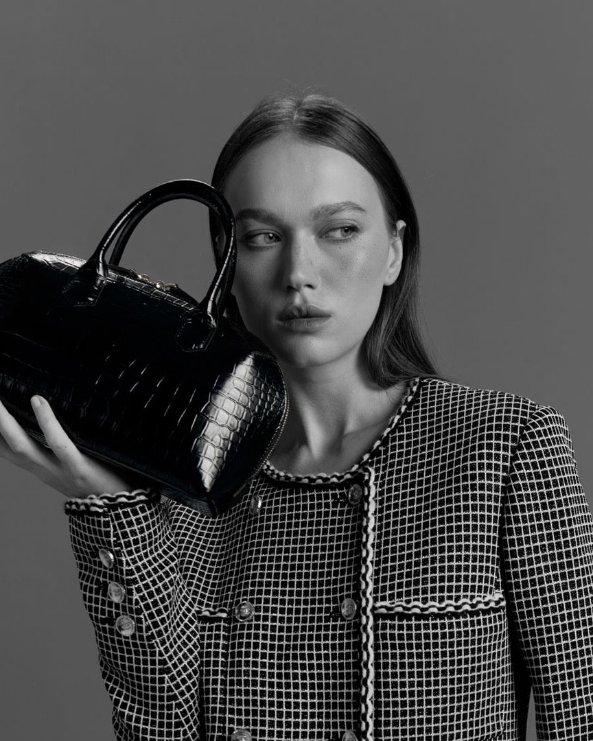 Model with the BOMBAY Black bag