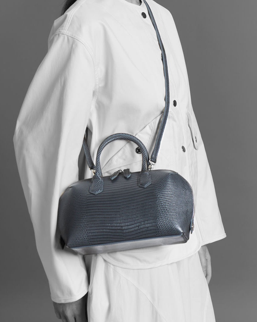 Model with the BOMBAY Mink Grey bag