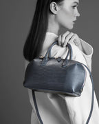 Model with the BOMBAY Mink Grey bag