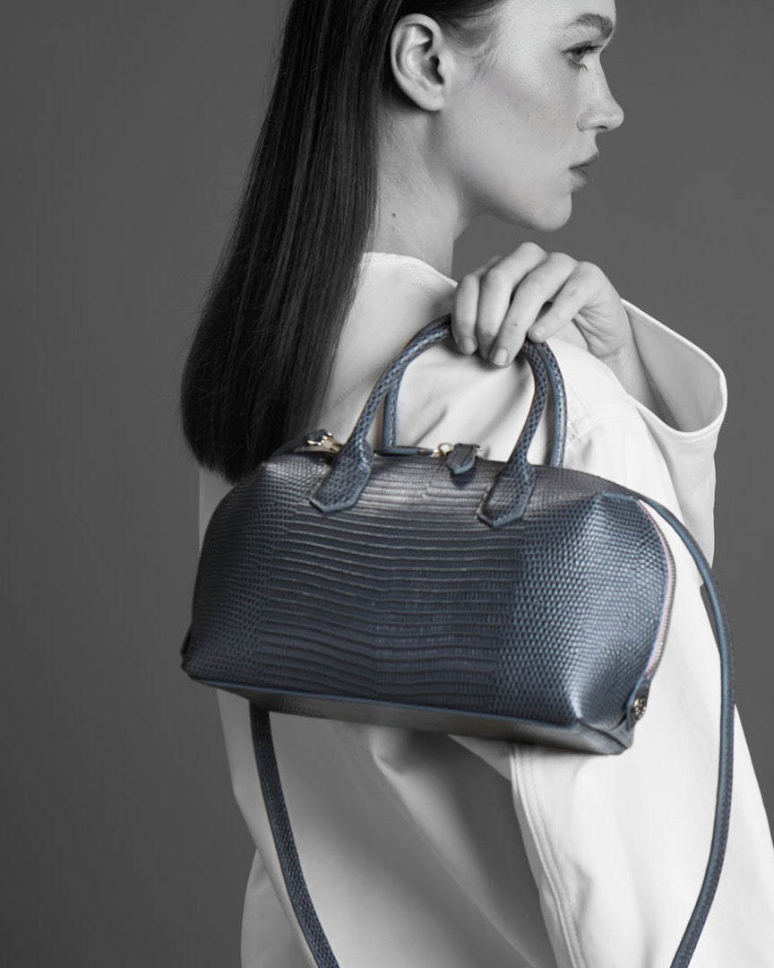 Model with the BOMBAY Mink Grey bag