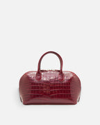 BOMBAY Ruby Red croc-embossed top-handle bag, front view