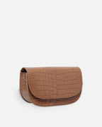 CARMEL Oat Brown croc-embossed crescent flap bag, side view