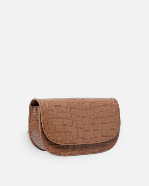 CARMEL Oat Brown croc-embossed crescent flap bag, side view