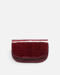 CARMEL Ruby Red croc-embossed crescent flap bag, front view