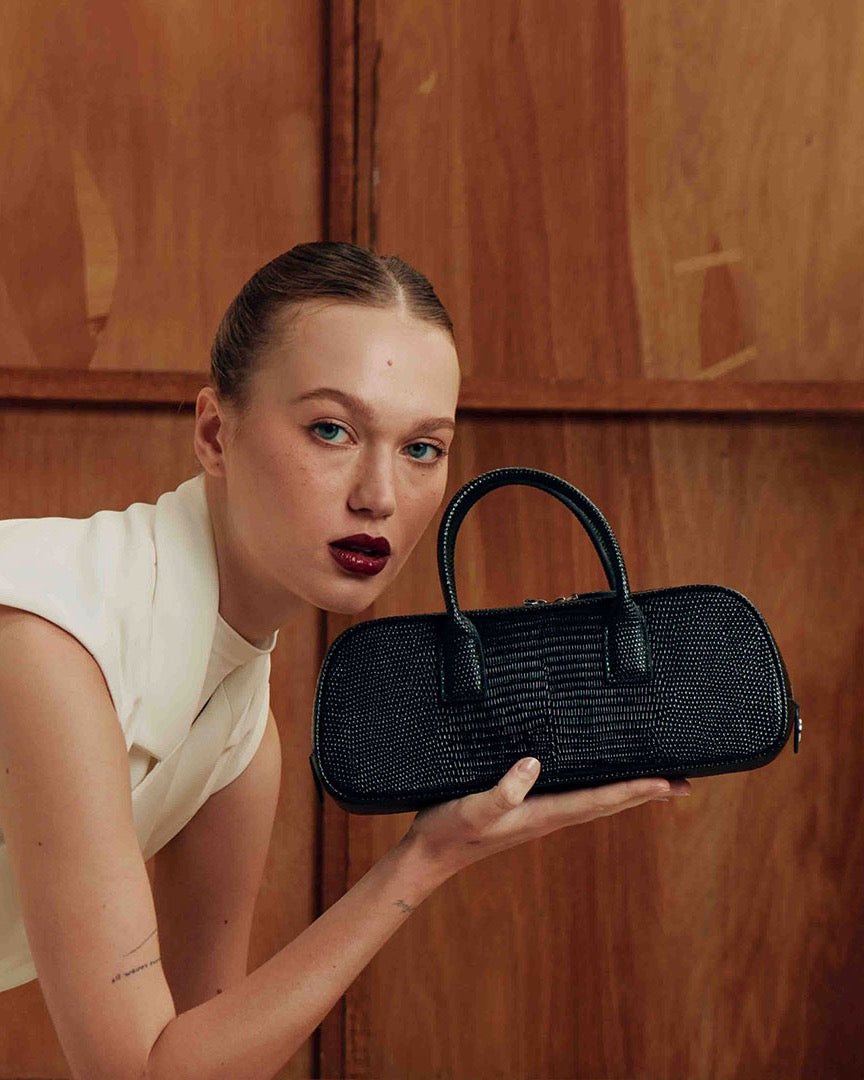 Model with the LUCCA STRETCH Black Lizard bag