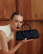 Model with the LUCCA STRETCH Black Lizard bag