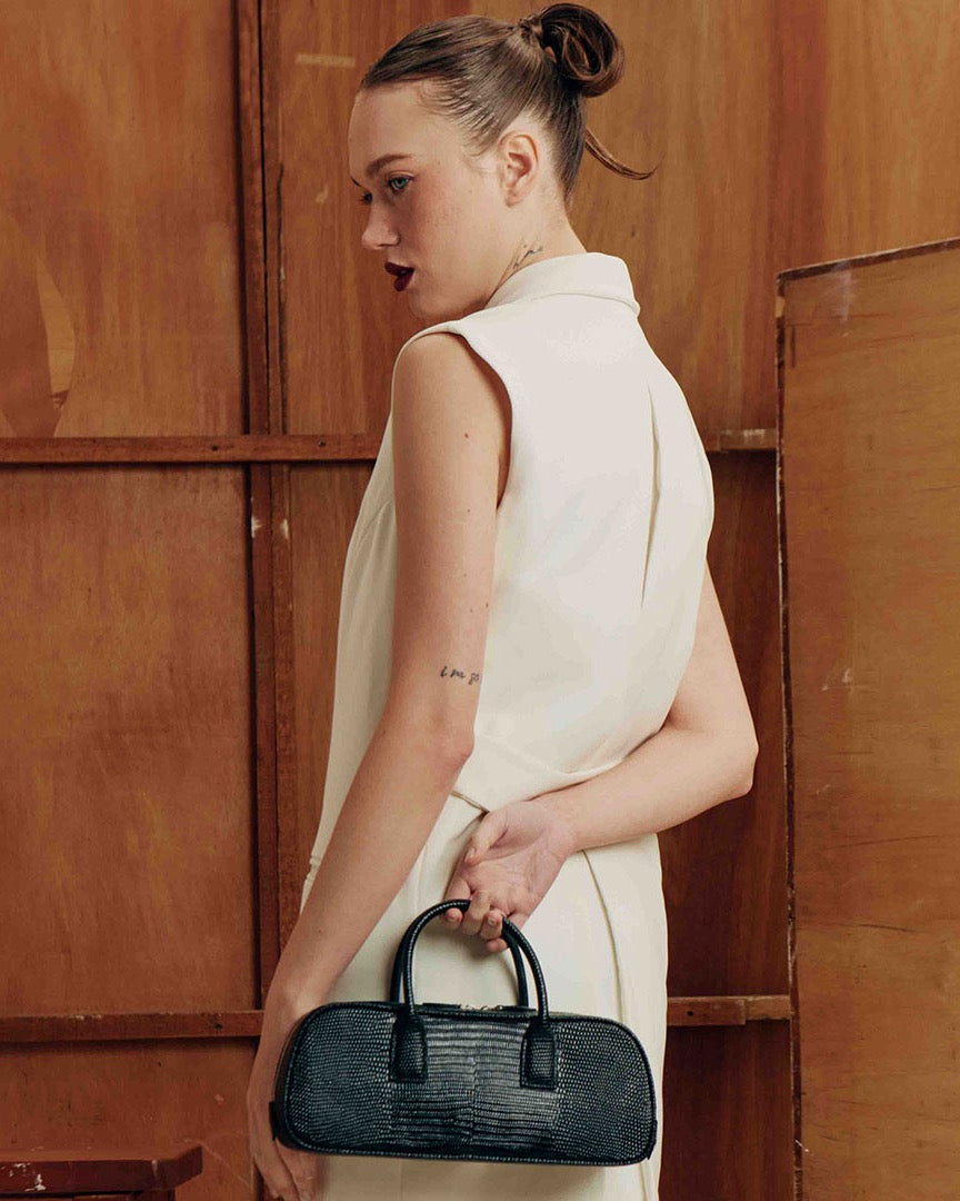 Model with the LUCCA STRETCH Black Lizard bag
