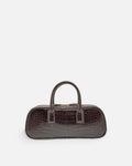 LUCCA STRETCH Cedar Brown croc-embossed elongated bowling bag, front view