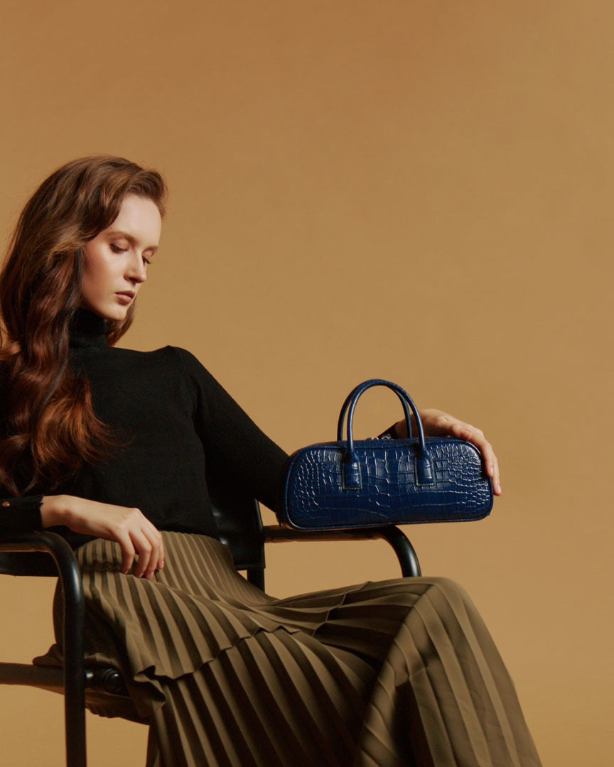 Model with the LUCCA STRETCH Midnight Blue bag