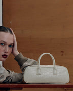 Model with the LUCCA STRETCH White Linen bag