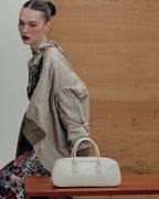 Model with the LUCCA STRETCH White Linen bag